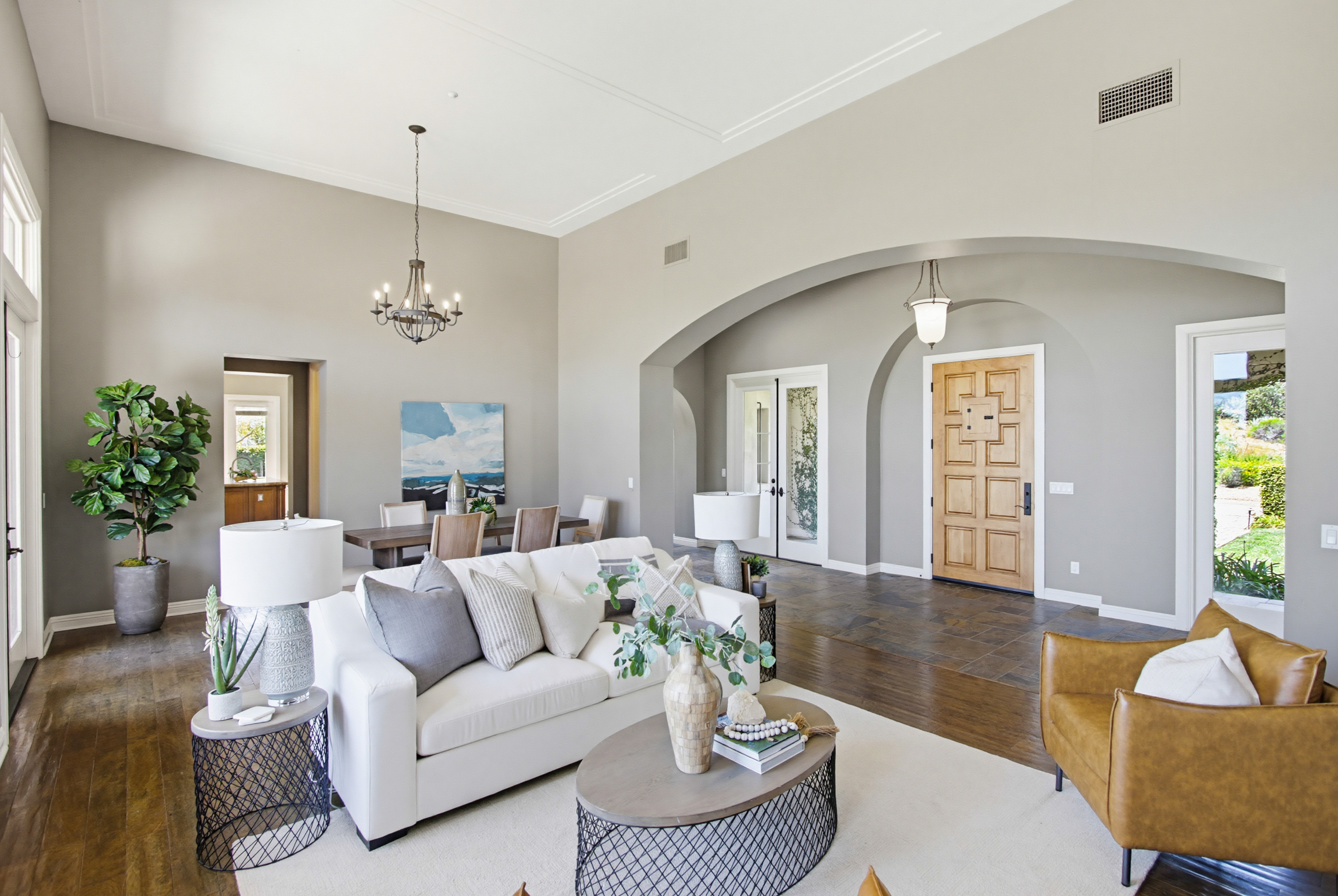 Grand staged foyer — the first impression San Diego buyers get at the door
