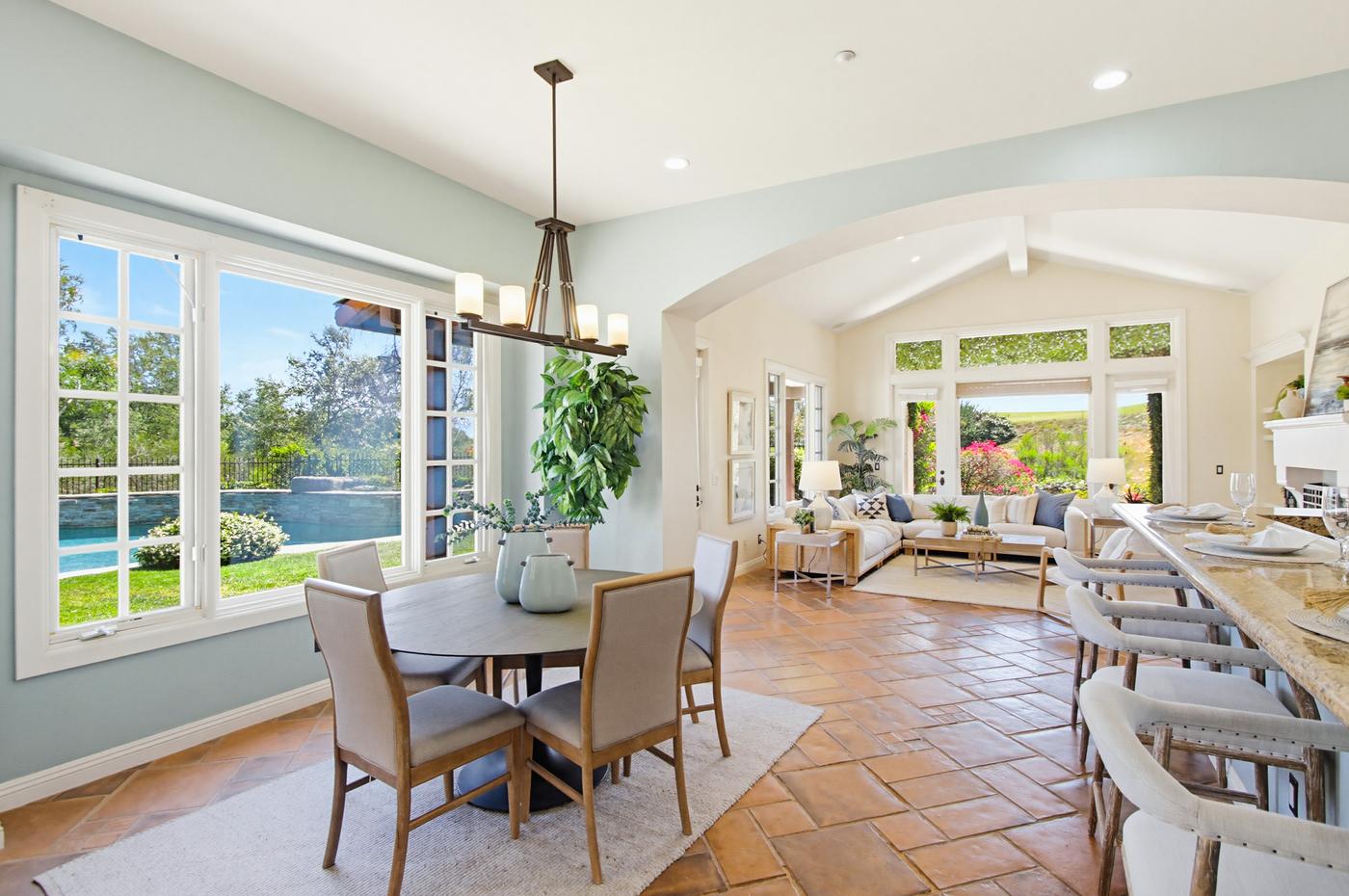 Santaluz staged kitchen dining room terracotta floors San Diego